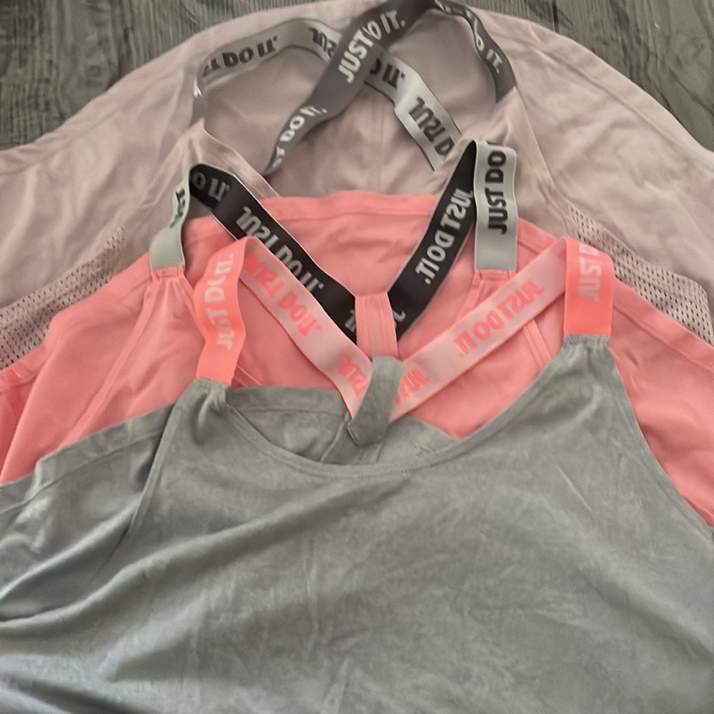 3 Nike tops size small.All 3 !!!